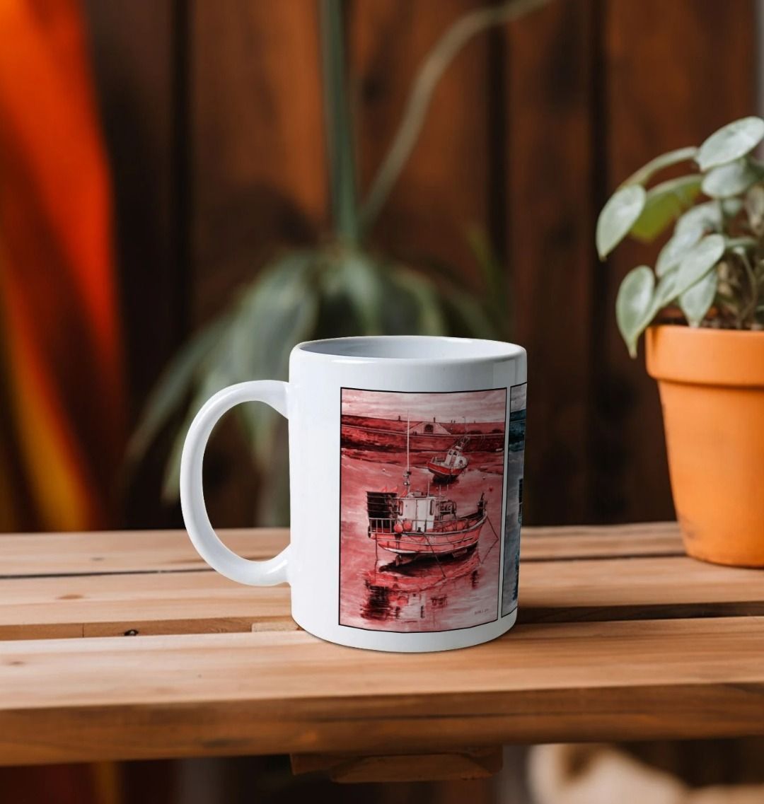 Image of a White Mug on a wooden shelf featuring multiple modified copies of the painting 'Lyme Regis at Low Tide' by Nick Dale. The handle is orientated to the left. The mug depicts 3 versions of a sunset scene where the fishing vessels rest on the floor of Lyme Regis harbour whilst the tourists enjoy the view from the Cobb. Each of the 3 versions is tinted a different colour; being red, blue and green.
