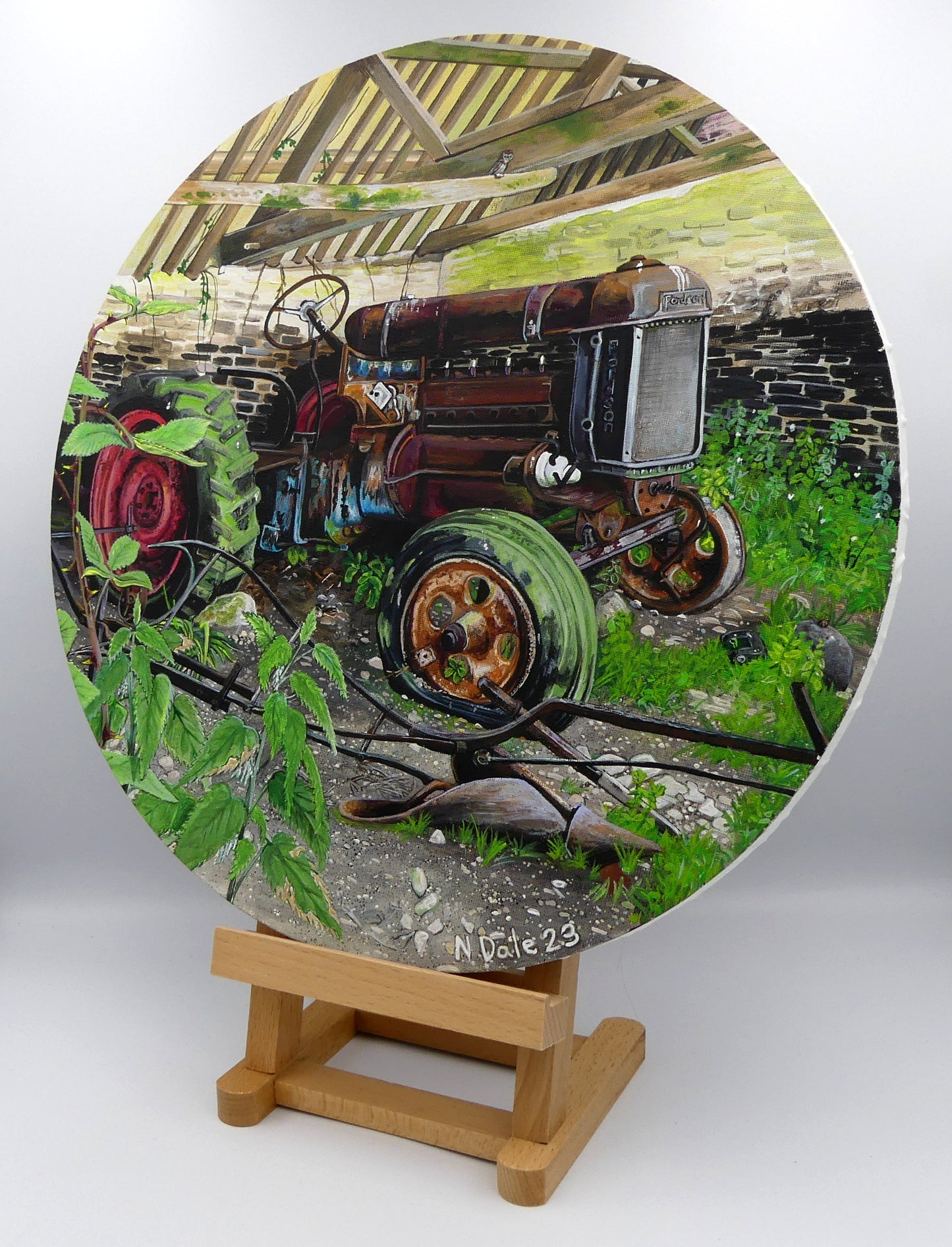 Image of the original painting 'A Well Deserved Rest At Tyneham' by Nick Dale. The painting depicts a Fordson Major tractor laid up in a farm building at the abandoned village of Tyneham in Dorset.