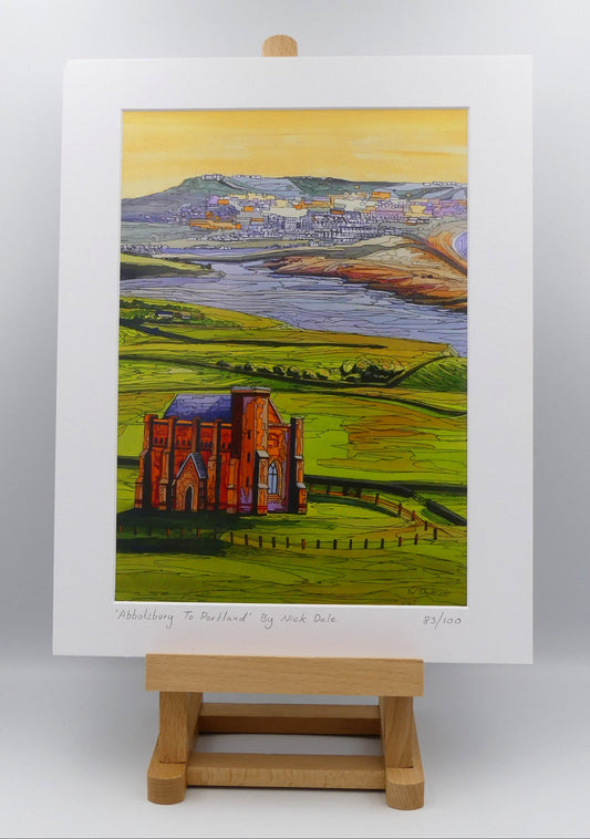 Image of a Medium Art Print featuring a copy of the painting 'Abbotsbury To Portland' by Nick Dale. The print depicts the view along the Dorset coast from St Catherine's Chapel above Abbotsbury, across The Fleet lagoon to Chesil Beach and ultimately to Portland beyond it. The print is situated on a small easel.