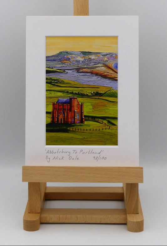 Image of a Small Art Print featuring a copy of the painting 'Abbotsbury To Portland' by Nick Dale. The print depicts the view along the Dorset coast from St Catherine's Chapel above Abbotsbury, across The Fleet lagoon to Chesil Beach and ultimately to Portland beyond it.  The print is situated on a small easel.