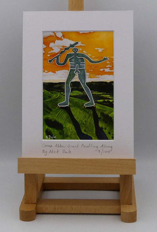Image of a Small Art Print featuring a copy of the painting 'Cerne Abbas Giant Pootling Along' by Nick Dale. The scene imagines the Cerne Abbas Giant chalk hill figure wandering across the Dorset landscape. The giant can be seen scaling Hod Hill in the Blackmore Vale. The print is situated on a small easel.