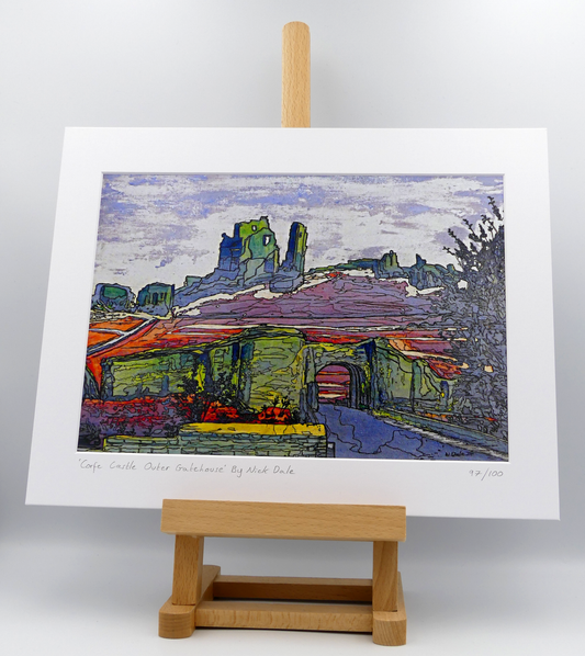 Image of a Medium Art Print featuring a copy of the painting 'Corfe Castle Outer Gatehouse' by Nick Dale. The print depicts the slighted outer gatehouse of Corfe Castle in the village of Corfe Castle, Dorset. Beyond it can be seen the castle's south-west gatehouse and keep on top of the central hilltop. The print is situated on a small easel.