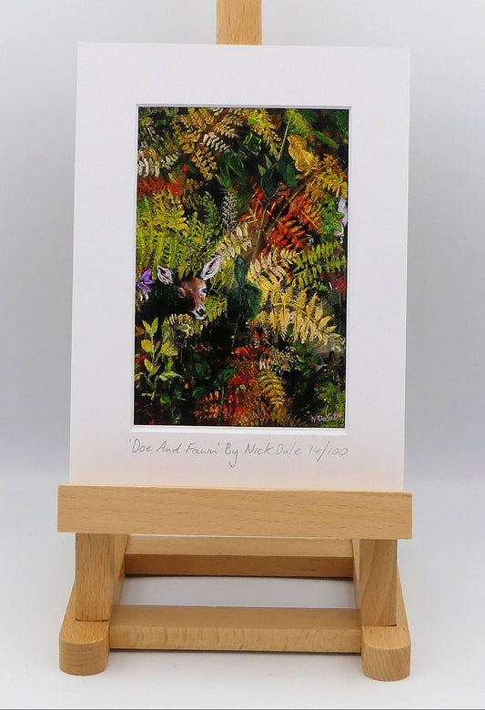 Image of a Small Art Print featuring a copy of the painting 'Doe And Fawn' by Nick Dale. The print depicts a Row Deer doe and fawn hiding in the dense undergrowth with only their heads visible.  The print is situated on a small easel.