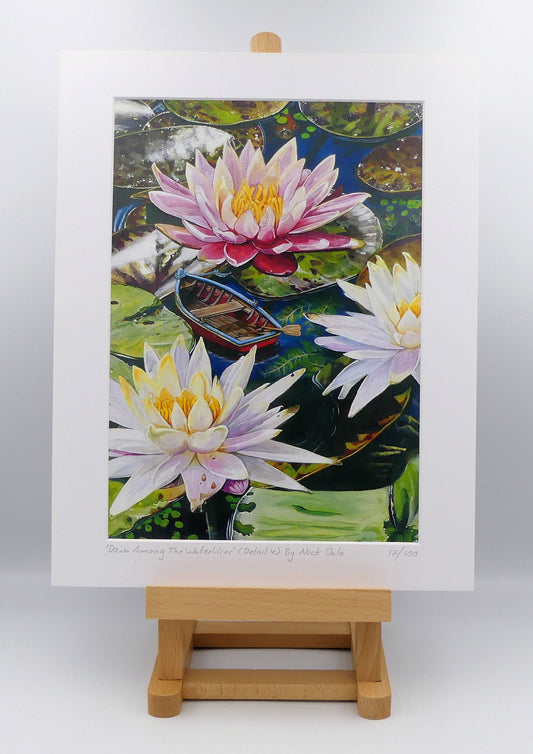 Image of a Medium Art Print featuring a copy of a detail from the painting 'Down Among The Water Lilies' by Nick Dale. The print depicts the part of the original painting showing the rowing boat and a close-up view of the water lilies at Bennetts Water Gardens in Weymouth, with the twist of the boat being shrunk down to lilliputian dimensions. The print is situated on a small easel.