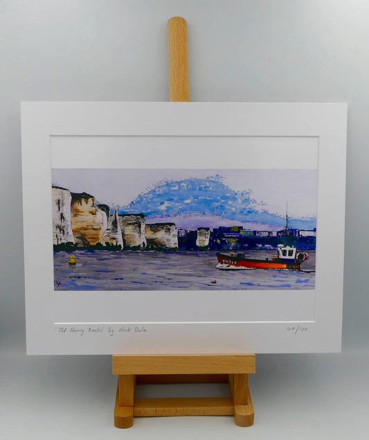 Image of a Medium Art Print (A4 size) featuring a copy of a detail of the painting 'Old Harry Rocks' by Nick Dale. The print depicts the chalk formations located at Handfast Point, south of Studland Bay; as viewed from Peveril Point, Swanage. Also depicted is a small fishing boat returning to Swanage and the Bournemouth skyline beyond the cliffs. The print is situated on a small easel.