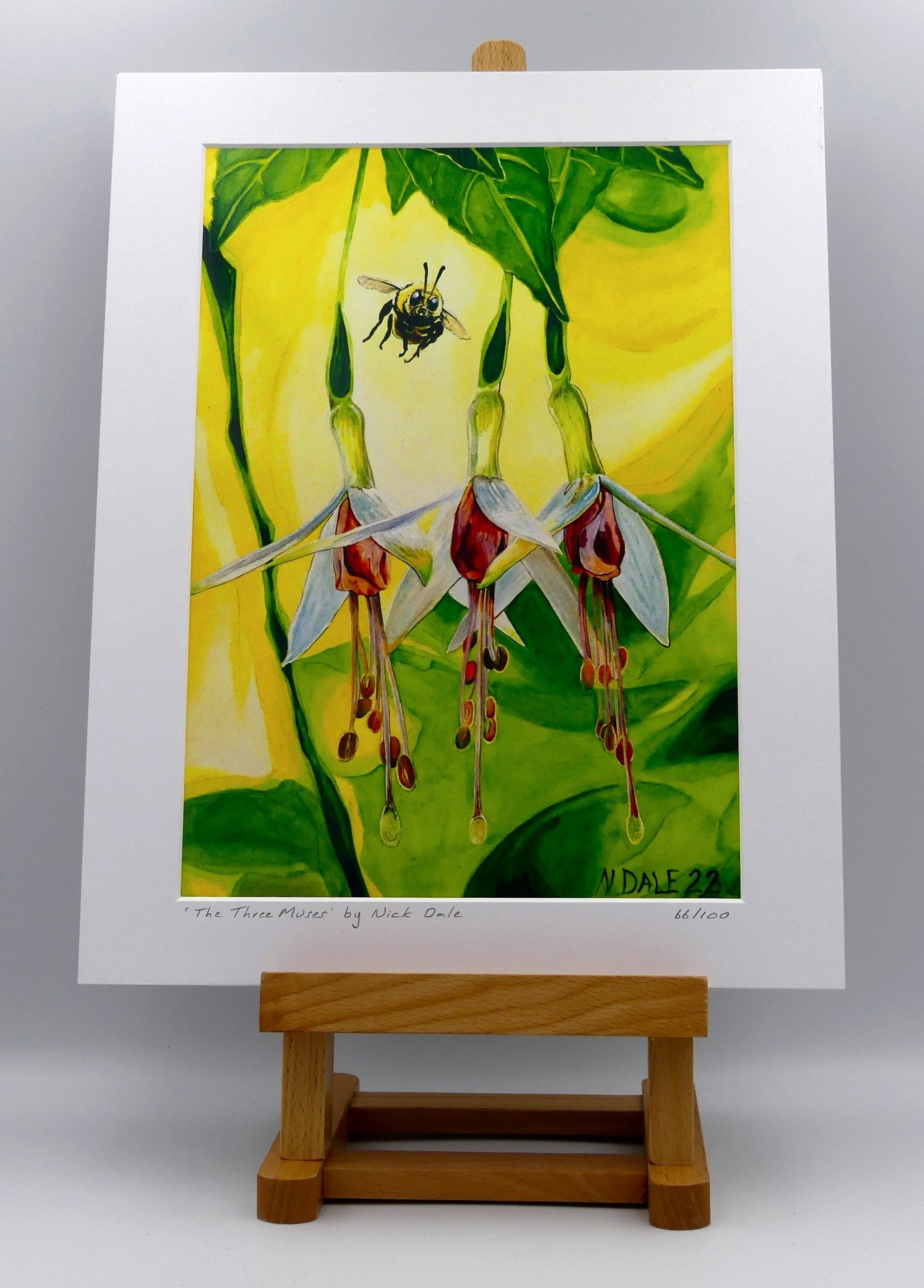 Image of a Medium Art Print featuring a copy of the painting 'The Three Muses' by Nick Dale. The print depicts a close-up view of a bee approaching its prize. But which will it choose? The print is situated on a small easel.