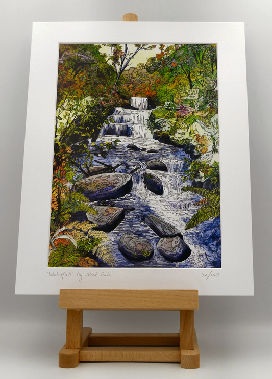 Image of a Medium Art Print featuring a copy of the painting 'Waterfall' by Nick Dale. The scene depicts the Hoar Oak Waterfall on the Hoar Oak Water moorland tributary of the East Lyn River at the famous National Trust site of Watersmeet House, Lynmouth, Devon. The print is situated on a small easel.