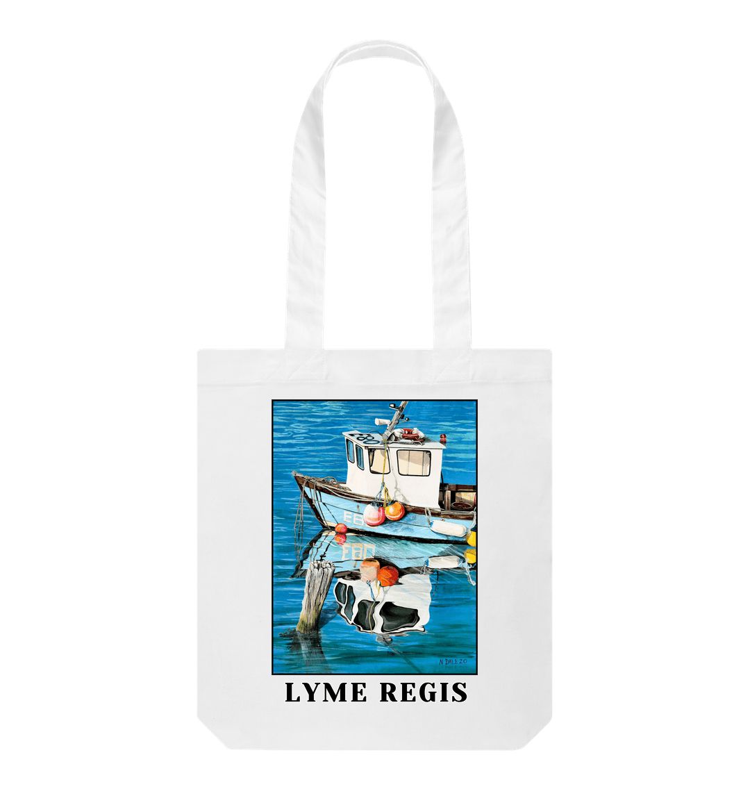 Image of a White Tote Bag featuring a copy of the painting 'God's Own 99 Flake Pierces The Veil' by Nick Dale, with the words 'Lyme Regis' written beneath it. The bag depicts a fishing boat at rest within the harbour of Lyme Regis, Dorset. The title is based on the similarity of the wooden pile to a chocolate flake as inserted into an ice cream cone. This seemed appropriate given the draw of the town to tourists.