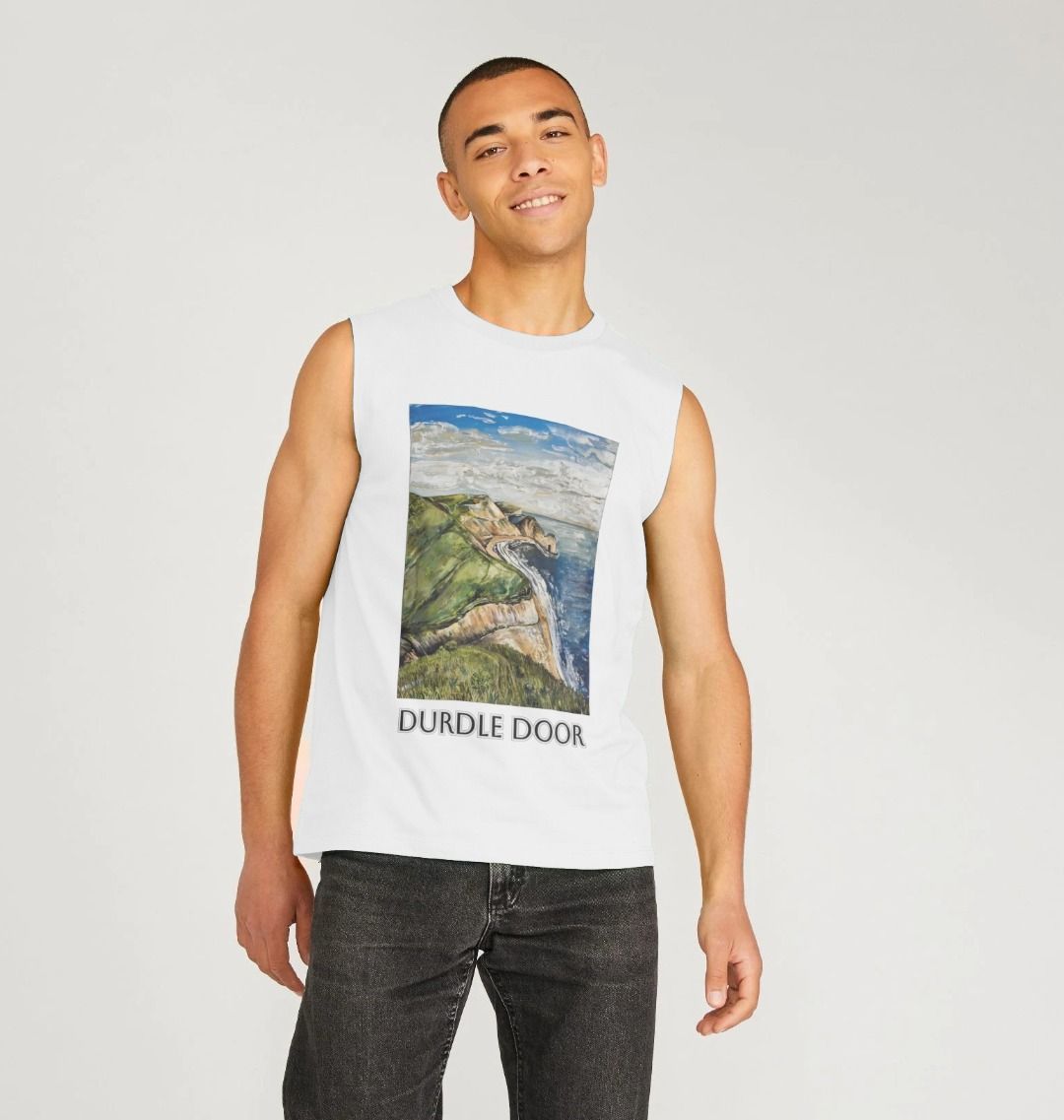 Image of a male model wearing a White Men's Organic Cotton Vest featuring a copy of the painting 'Durdle Door From The West' by Nick Dale with the words 'Durdle Door' written below it. The vest depicts a view along the Jurassic Coast to the famous Dorset limestone arch landmark, as seen from the coastal path to the west.