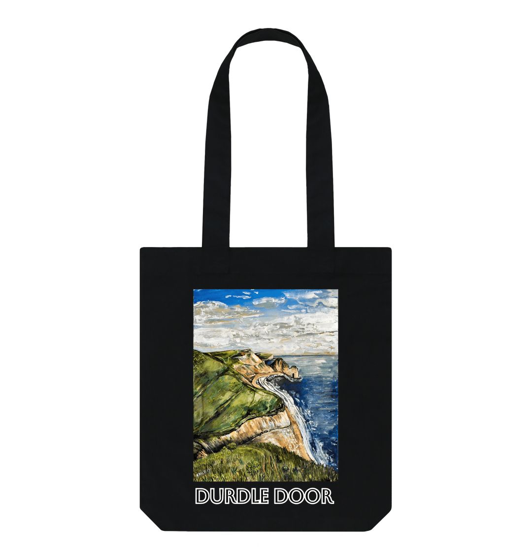 Image of a Black Tote Bag featuring a copy of the painting 'Durdle Door From The West' by Nick Dale with the words 'Durdle Door' written below it. The bag depicts a view along the Jurassic Coast to the famous Dorset limestone arch landmark, as seen from the coastal path to the west.