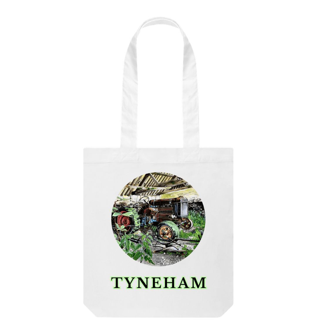 Image of a White Tote Bag featuring a copy of the painting 'A Well Deserved Rest At Tyneham' by Nick Dale. The bag depicts a Fordson Major tractor laid up in a farm building at the abandoned village of Tyneham in Dorset.