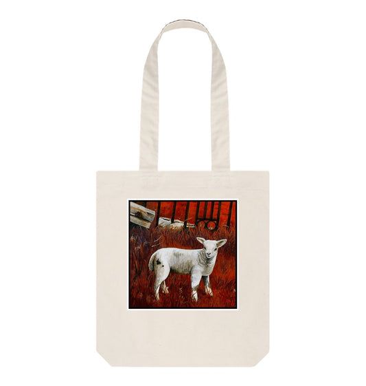 Image of a Natural Tote Bag featuring a modified copy of a detail from the painting 'The Gate' by Nick Dale. The bag depicts a lamb in front of an ornamental garden gate reused by a farmer somewhere in North Devon, probably to the south of Valley of Rocks, Lynton. The lamb was observed on Lundy Island, Devon.