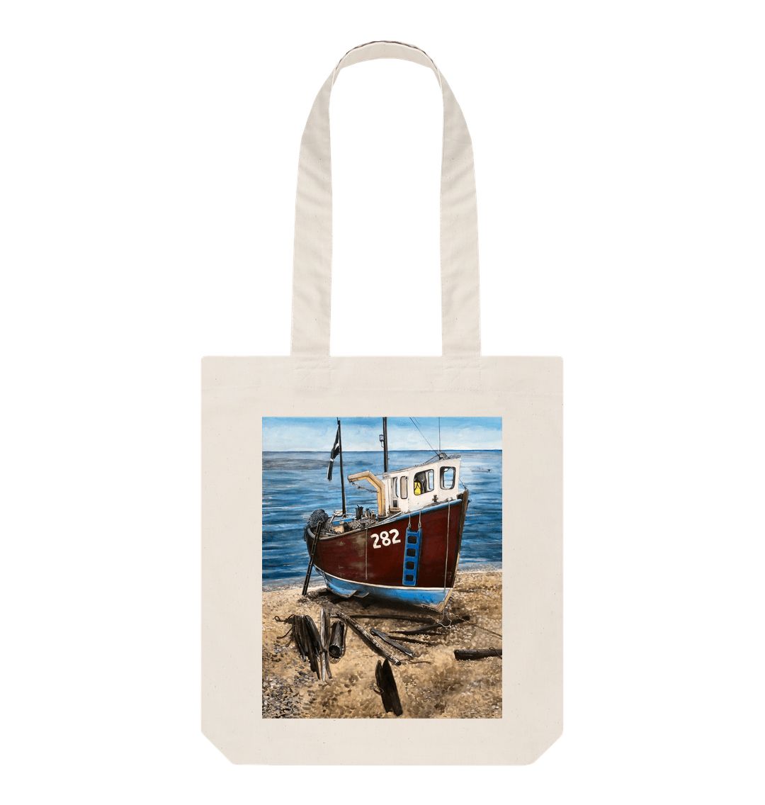 Image of a Natural Tote Bag featuring a copy of the painting 'Relaxing Beer' by Nick Dale. The bag depicts a fishing boat beached at Beer, Devon. The wood is laid under the boats to aid in their winching up the shingle beach.