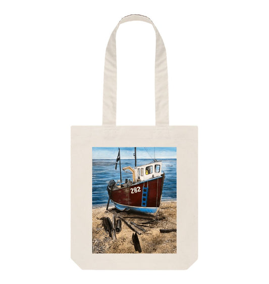 Image of a Natural Tote Bag featuring a copy of the painting 'Relaxing Beer' by Nick Dale. The bag depicts a fishing boat beached at Beer, Devon. The wood is laid under the boats to aid in their winching up the shingle beach.