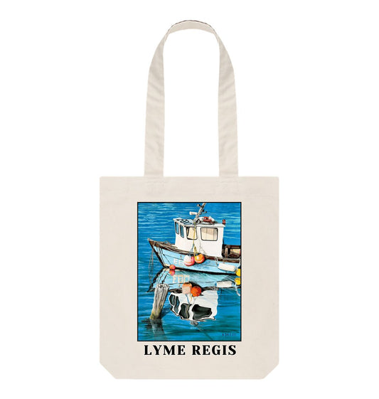 Image of a Natural Tote Bag featuring a copy of the painting 'God's Own 99 Flake Pierces The Veil' by Nick Dale, with the words 'Lyme Regis' written beneath it. The bag depicts a fishing boat at rest within the harbour of Lyme Regis, Dorset. The title is based on the similarity of the wooden pile to a chocolate flake as inserted into an ice cream cone. This seemed appropriate given the draw of the town to tourists.