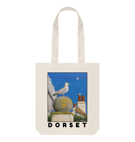 Image of Natural Tote Bag featuring a copy of the painting 'A View Of The Sea At Lyme Regis' by Nick Dale. The bag depicts a gull and buildings along Marine Parade, Lyme Regis.