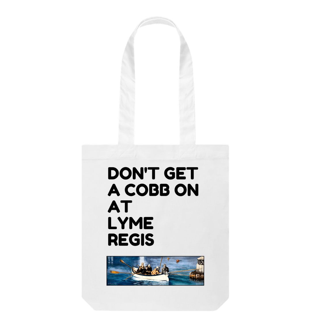Image of a White Tote Bag featuring a copy of the painting 'The Return to Base at Lyme Regis' by Nick Dale with the slogan 'Don't Get A Cobb On At Lyme Regis' written above it. The bag depicts the crew of a gig rowing boat returning to Lyme Regis Harbour to take a well-earned rest.
