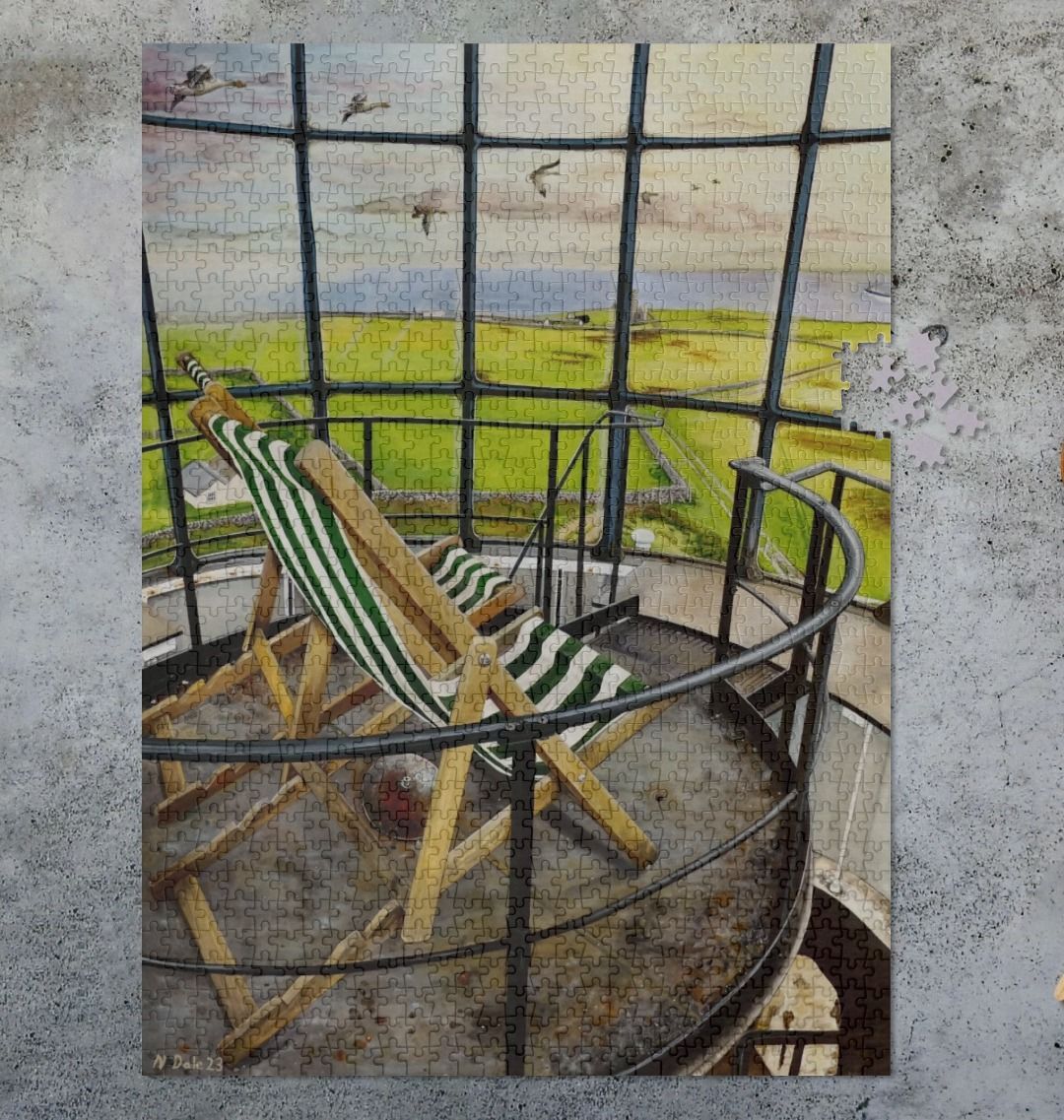 Image of a 1000 Piece Jigsaw Puzzle featuring a copy of the painting 'Let's Be Together Alone' by Nick Dale. As displayed partially completed on a grey surface. The jigsaw depicts the view from the lantern room of the Old Light lighthouse on Beacon Hill, on the island of Lundy, Devon.