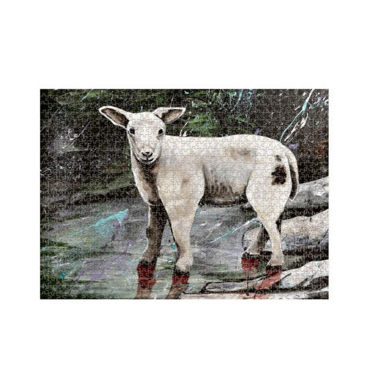 Image of a 1000 Piece Jigsaw Puzzle featuring a copy of the painting 'The Lamb Of Lundy' by Nick Dale. The jigsaw depicts a close-up study of a lamb observed on the island of Lundy, Devon.