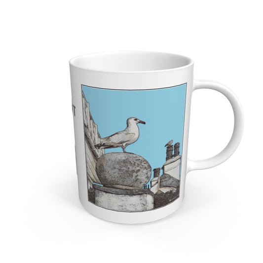 Image of a White Mug featuring a modified copy of the painting 'A View Of The Sea At Lyme Regis' by Nick Dale - this being the 'Light Blue' version. The mug depicts a gull and buildings along Marine Parade, Lyme Regis.