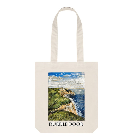 Image of a Natural Tote Bag featuring a copy of the painting 'Durdle Door From The West' by Nick Dale with the words 'Durdle Door' written below it. The bag depicts a view along the Jurassic Coast to the famous Dorset limestone arch landmark, as seen from the coastal path to the west.